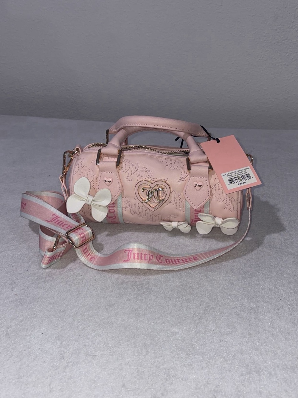 Juicy Couture Light Pink Barrel Crossbody with White Bow Accents
